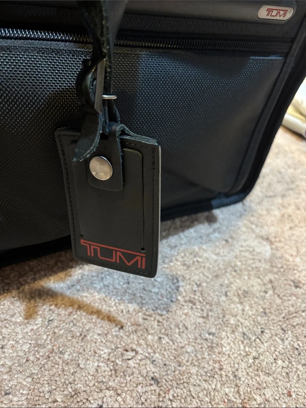 Tumi Black Rolling Carry-On Duffel with Wheels and handle